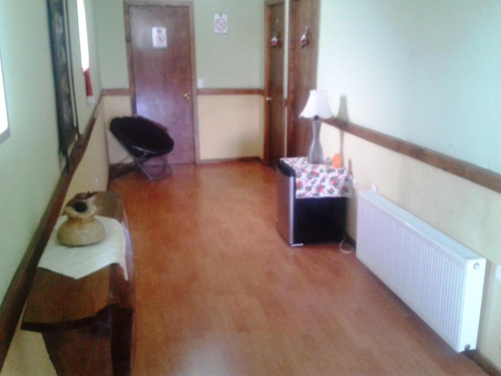 Hostal El Rincón Puerto Natales Quarto foto